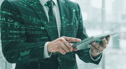 Businessman using tablet with digital data visualization overlay. financial information with green tech interface. Digital transformation in corporate world. fintech services, business