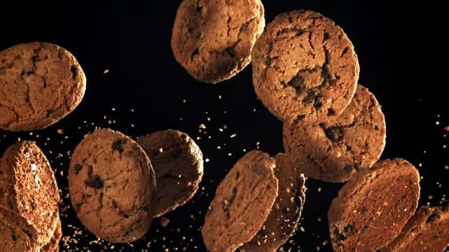Oatmeal cookies fly up and fall down. Filmed on a high-speed camera at 1000 fps. High quality FullHD footage