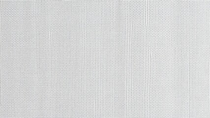 Close-up view of a finely woven fabric texture exhibiting a uniform pattern of small, regularly spaced dots.