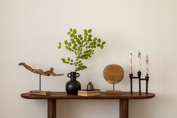 Stylish and minimalist composition on wooden design commode with copy space, flowers in vase,...