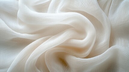 Fototapeta premium Flowing white fabric texture with elegant wavy patterns in soft light