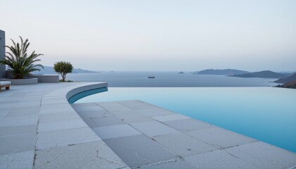 Obraz premium Infinity Pool Overlooking Ocean at Dusk