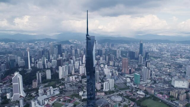 Panorama of Kuala Lumpur, Malaysia on a sunny day. Aerial drone view of Merdeka 118 tower megastructure
