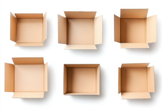A top down view of six empty cardboard boxes arranged on a white surface in a grid pattern