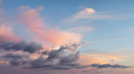 Soft Pastel Clouds Under a Serene Sky with Smooth Gradients of Color at Dusk