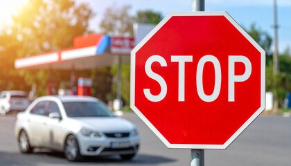 Red Octagonal STOP Sign at Roadside for Traffic Control