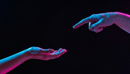  Idea of earth creation. Hands reaching out, pointing finger together on black and neon color 