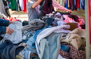 A person looking for some deals in a flea market