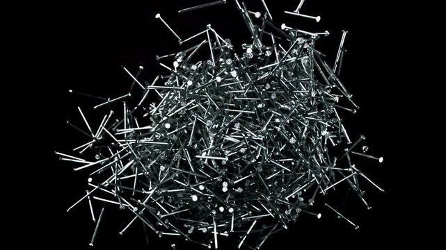 The nails fly up and fall down. Filmed on a high-speed camera at 1000 fps. High quality FullHD footage