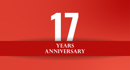Celebrating 17 Years: A vivid red backdrop highlights a milestone of seventeen years, symbolizing growth and achievement.