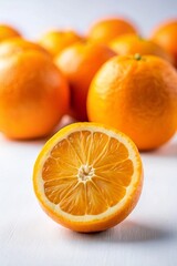 A ripe orange fruit in the centre of the photo with a slice resting on its top, showcasing its freshness and natural beauty. white background. 