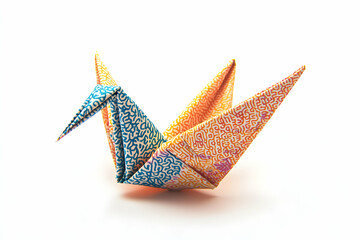 Vibrant origami crane crafted from patterned paper, showcasing intricate folds and a playful design.  Perfect for illustrating creativity, artistry, and Japanese culture.