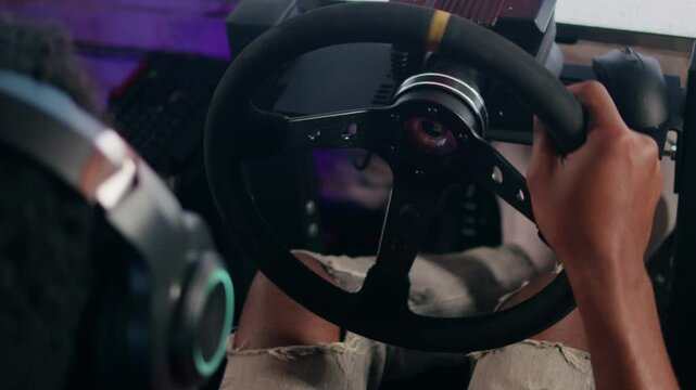 Gamers are playing racing games on a car simulator with a steering wheel background, race drive simulator driving school classes. 