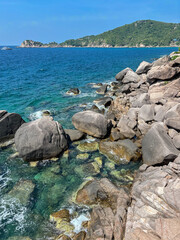 Beautiful photo of the sea with rocks and mountains.