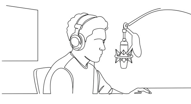 Young man recording audio at microphone in studio setting  