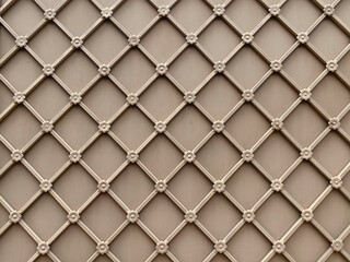 Decorative lattice design with flower motifs on neutral background