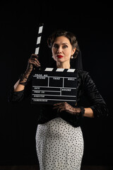 Retro Style Actress with Clapperboard Ready for Role