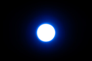Bright Blue Light Glow Against Dark Background