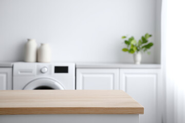 Minimalist laundry room with wooden countertop, white cabinets, and washing machine in background
