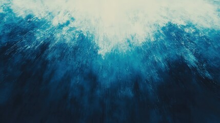 Obraz premium Abstract blue and white splash resembling ocean waves, creating a dynamic underwater effect