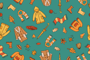 Warm autumn clothes seamless pattern. Knitted sweater, hat, scarf, socks. Cozy bright colorful autumn background in doodle style. Vector