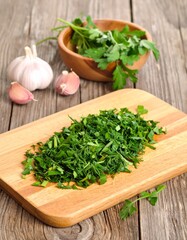 woman hands cutting vegetables on kitchen board