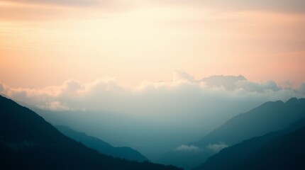 Fototapeta premium Mountain Sunrise Over Misty Peaks