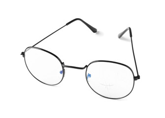 Eyeglasses with broken lens isolated on white