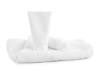 Cosmetic products and towel isolated on white