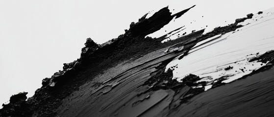 Abstract monochrome texture with rough strokes and contrasting tones creating a dramatic visual impact and evoking a sense of raw energy in a minimalist style