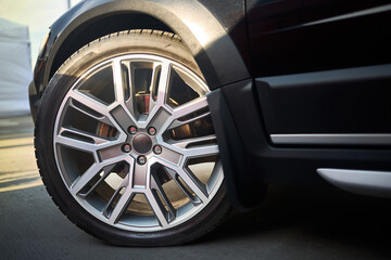 Car detail shot. Wheel selective focus close up.