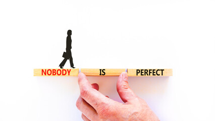 Nobody is perfect symbol. Concept words Nobody is perfect on beautiful wooden block. Beautiful...