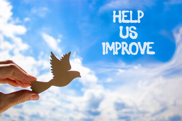 Help us improve symbol. Concept words Help us improve on beautiful blue sky. Beautiful blue sky and...