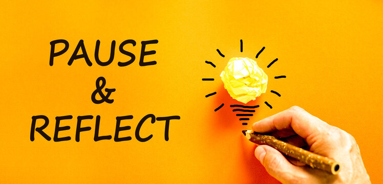 Pause and reflect symbol. Concept words Pause and reflect. Beautiful orange background. Businessman hand with pencil. Business motivational lifestyle pause and reflect concept. Copy space. - Powered by Adobe