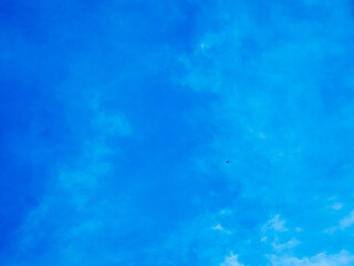 Clear blue sky with clouds for background