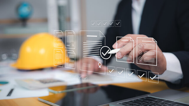 Approved buildings permit concept with approved residential building project, Construction project inspection, Architect or engineer Checking the list of documents and approving the project.