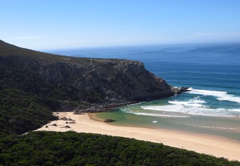 Peaceful Coastal Shoreline of Nature's valley South africa, with Vast Blue Ocean and Clear Sky