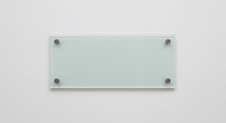 Well illustrated image. Frosted glass signboard mounted on white wall