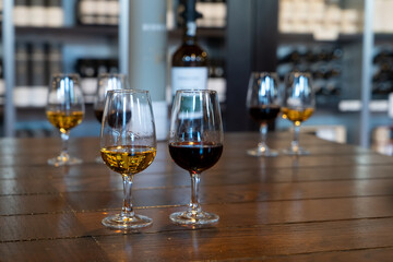 port wine testing, glasses with drink samples in bar