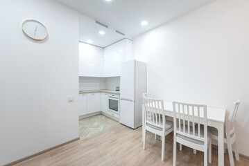 Modern Home Kitchen Featuring White Interior and Furniture