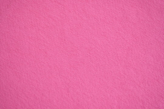 Pink fleece fabric texture, macro texture fleece pink fabric photo above as background	
