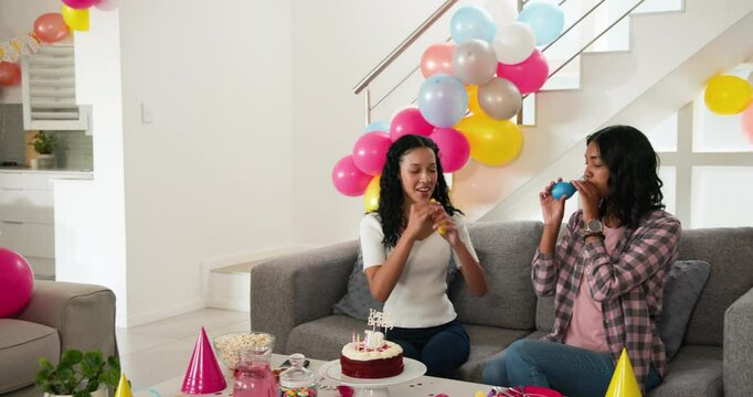 Multiracial mother and teenage daughter decorating modern home interior, with balloons and banner