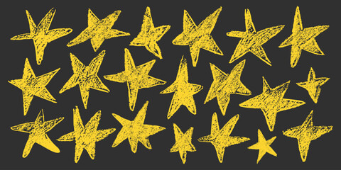 Set of chalk doodle stars. Grunge yellow stars with crayon texture. Hand drawing shape in kid sketch style on black background.	