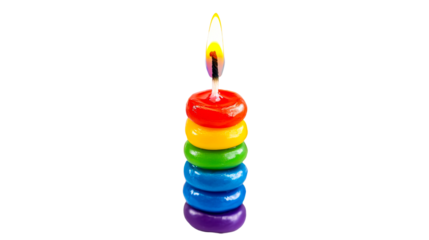 Colorful candle with rainbow layers and flame