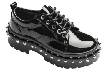 Stylish black patent leather studded platform shoes edgy punk rock design bold statement piece on transparent background