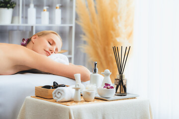 Caucasian woman customer enjoying relaxing anti-stress spa massage and pampering with beauty skin...