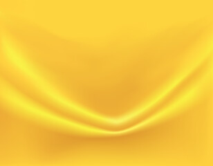 Close-up texture of smooth golden silk material. Shiny gold background with smooth texture of fabric folds. Textile pattern.