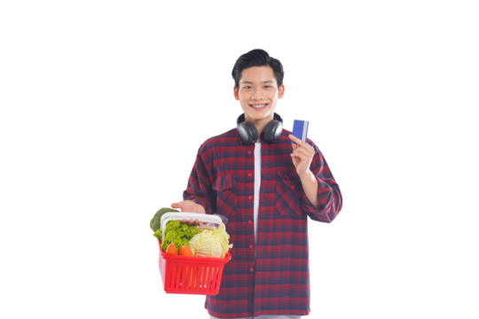 portrait of asian man holding shopping basket posing on white background, shopping concept