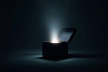 Mysterious black gift box is opening with a glowing light inside, creating a magical atmosphere