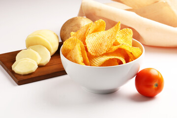 Crispy potato chips served in a bowl